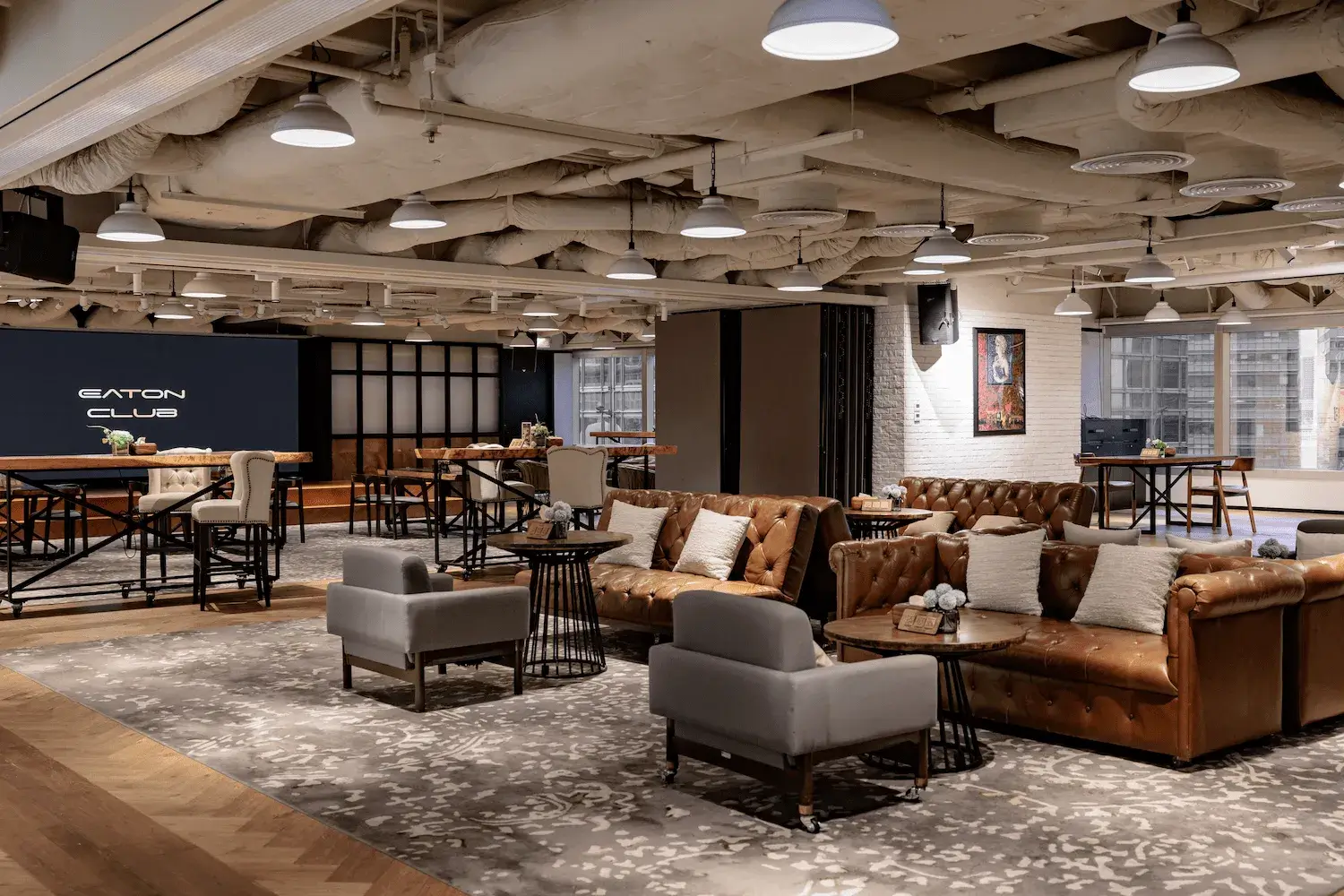 Eaton Club Central event venue with lounge seating, leather sofas and high tables.
